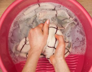 Hand delicate washing of clothes.